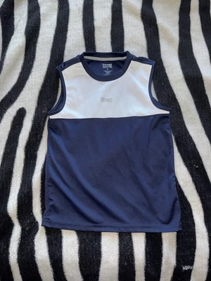 Camiseta sin mangas para mujer con material azul y suave Foto 1 de 4