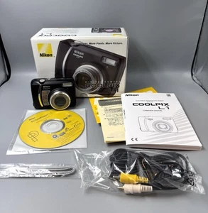 Nikon Coolpix L1 6,2 megapixel fotocamera digitale testata funziona con scatola scheda SD cavo manuale - Foto 1 di 9