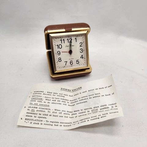 Seth Thomas VINTAGE Travel Clock Folding Portable Alarm Wind Up Tan Gold Works Cover
