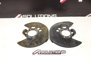 2009-2021 Nissan 370Z Front Brake Dust Shields Akebono BBK OEM - Picture 1 of 8