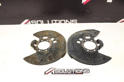 2009-2021 Nissan 370Z Front Brake Dust Shields Akebono BBK OEM - Image 1 of 4