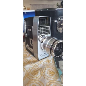 Cámara de cine vintage Bell & Howell ZooMatic ojo eléctrico - con estuche y manual - Imagen 1 de 11
