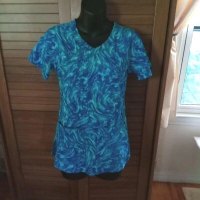 Blusa Médica Carhartt Para Mujer Talla Xs Estampada Tres Bolsillos Manga Corta Cuello en V Foto 1 de 4