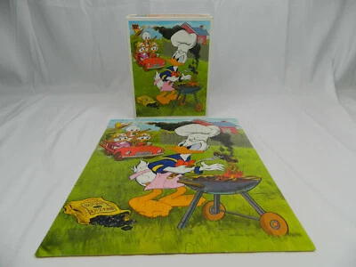 Quebra-cabeça Walt Disney’s Donald Duck Grilling Huey Dewey Louie Whitman 1982 100 peças - Imagem 1 de 4