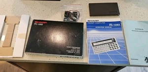 Calcolatrice vintage come nuova Sharp Pocket Computer PC-1262 in scatola Astrofix molto rara - Foto 1 di 13