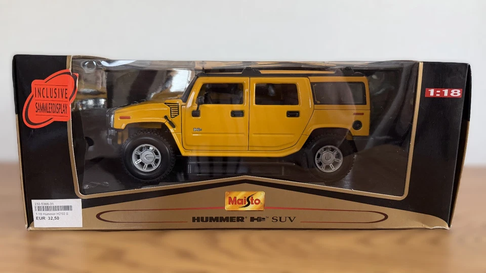 Maisto Premiere Edition Hummer H2 SUV 1:18 giallo confezione originale - Immagine 1 di 4