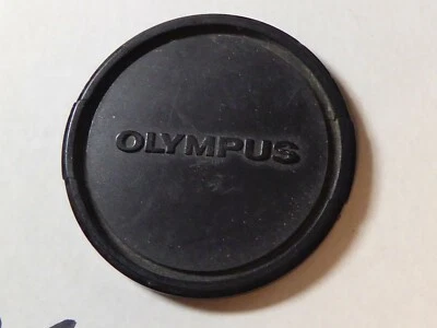 Clean Genuine Olympus OM 49mm lens cap, Genuine Olympus camera lens cap black  - Image 1 of 2