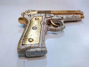 PISTOLA ARMA CERAMICA AVORIO FOGLIA ORO CON CRISTALLI ARREDO CASA SOPRAMMOBILE - Imagen 1 de 1