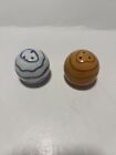 SALT AND PEPPER SHAKERS TWO SMALL BEACH BALLS WITH CONCENTRIC LINES