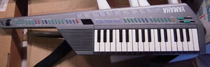 Yamaha SHS-10 S Silber Fm Synthesizer Keyboard Schulter Midi mit Armband - Bild 1 von 2