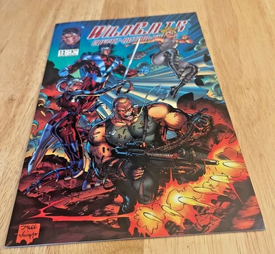@@ WILDCATS COVERT ACTION TEAMS..#12..DC  COMICS..VG. PRE-OWNED - Image 1 of 2