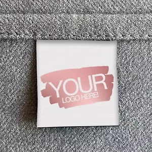 Logotipo Oro Blanco y Rosa Brillante Personalizado Etiquetas de Costura Tela Ropa Coser Plegado - Imagen 1 de 3
