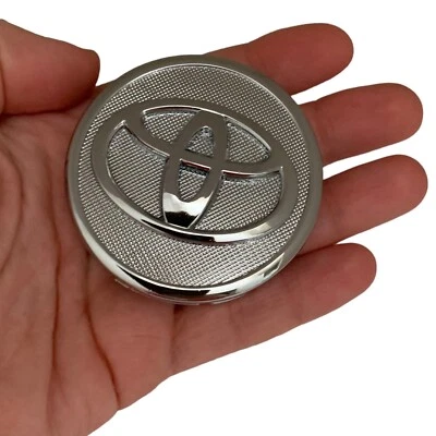 1x Tapacubos central para llantas Toyota base plateada logotipo cromado 57 mm Prius Corolla Foto 1 de 2
