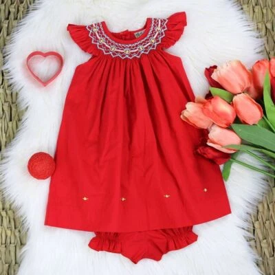 Vestido bebé niña Red Bishop ajustado. Vestido vintage Smocking Bishop para niñas pequeñas. Foto 1 de 4