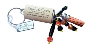 Rex Goliath Wein Korken Quaste Schlüsselanhänger orange & schwarz Handarbeit - Bild 1 von 5