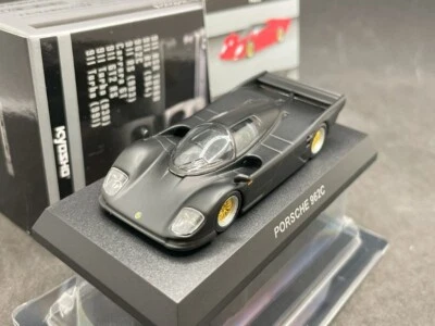 Coche modelo diecast negro Kyosho 1/64 Porsche collection6 962C 73C2 Foto 1 de 4