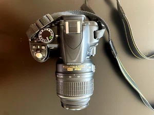 Fotocamera reflex Nikon D3100 + obiettivo nikkor 18-55mm f 3.5-5.6 + batteria - Foto 1 di 4
