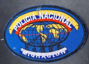 Distintivo manica distintivo tessuto Policia polizia patch nacional migracion RARO - Foto 1 di 1