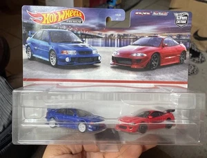 Hot Wheels Exclusive 1: 64 2 Pk - Mitsubishi 95 Eclipse & Lancer Evo VI New 2023 - Picture 1 of 5