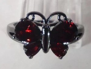 Roter künstlicher Granat Schmetterling schwarz Edelstahl Größe 9 - Bild 1 von 4