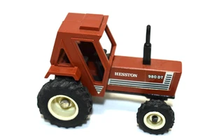 Ertl 1:64 980 DT Hesston Tractor FWD Brown - Picture 1 of 3