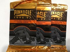 Three (3) packs pinnacle 1996-97 NHL hockey cards. 