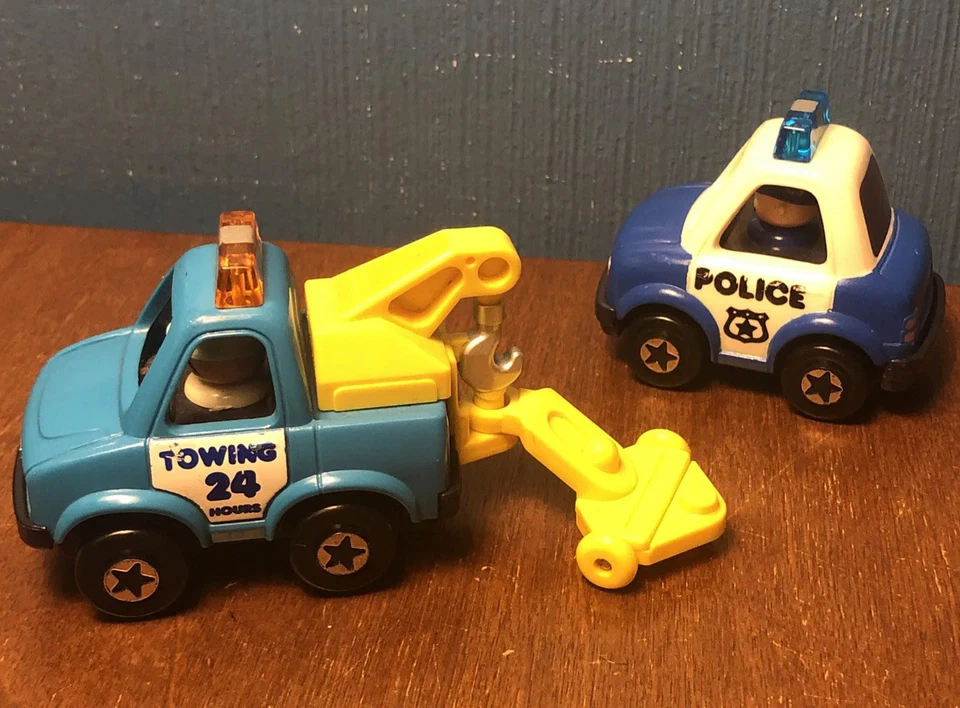 Lote de coches retrocededores Tomy Toys vintage años 90 1991 - camión de remolque policía hombre funcionando Foto 1 de 4