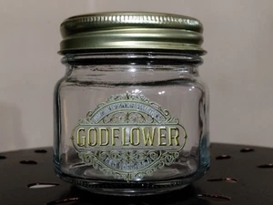 Tarro de vidrio coleccionable con tapa dispensario marca Godflower - Imagen 1 de 5