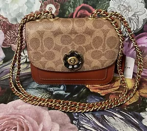 Borsa a tracolla Coach rivestita in tela bicolore firmata Madison 16 Turnlock marrone - Foto 1 di 4