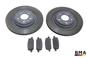 Juego de rotores y pastillas de freno trasero izquierdo derecho Tesla Model 3 2017-2023 OEM - Imagen 1 de 17
