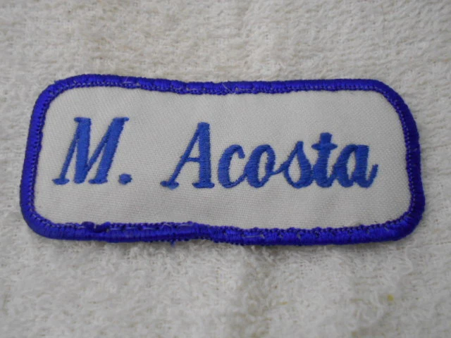 M. ACOSTA  USED EMBROIDERED  SEW ON NAME PATCH TAGS BLUE ON WHITE - Image 1 of 1