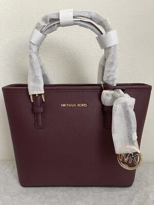 NWT Michael Kors Jet Set Travel Extra-Small Leather Top-Zip Tote Bag Oxblood - Image 1 of 4