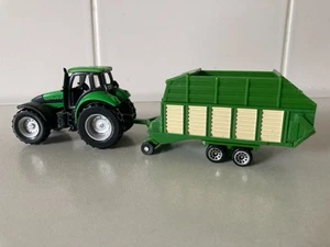 Siku Deutz Fahr Agroton 265 Traktor mit Heuladewagen grün M.1:87 - Bild 1 von 11