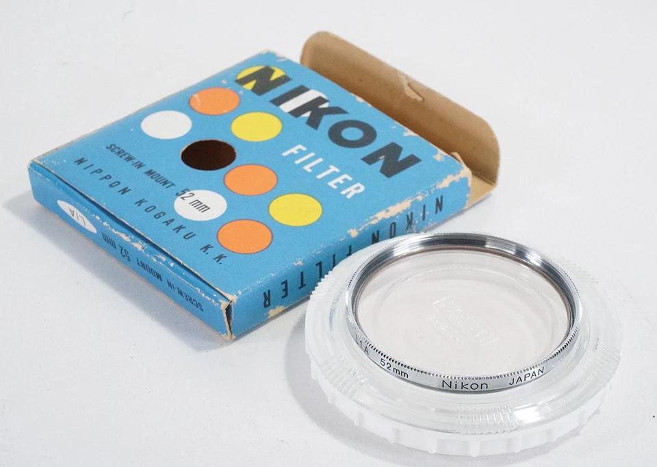 NIKON FILTER, 52MM L1A SKYLIGHT + NKK PLASTIC CASE AND WORN BLUE BOX/222689 - Image 1 of 1