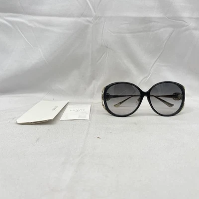 Gafas de sol Gucci redondas de gran tamaño degradadas mariposa GG0226SK negras/doradas usadas Foto 1 de 4