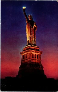 Vintage New York NY Postcard Statue of Liberty at Night Lit up 1957 2 Cent Stamp - Picture 1 of 4