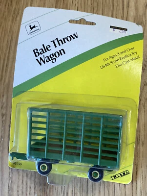 Ertl John Deere 1995 vagón de tiro de pacas escala 1/64 #5755 nuevo en paquete Foto 1 de 2