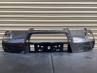 Aston Martin Vantage V8 V12 OEM Carbon Fiber Rear Bumper Diffuser DD2317E955AA - Image 1 of 4