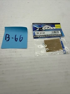 XRAY STEEL SHIM FOR LOWER SUSP. HOL - XY303131 - Picture 1 of 1