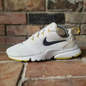 bright yellow nike presto womens