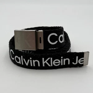 Cinturón de lona Calvin Klein Jeans negro blanco deletreado para hombre talla M 34/36 ajustable - Imagen 1 de 7