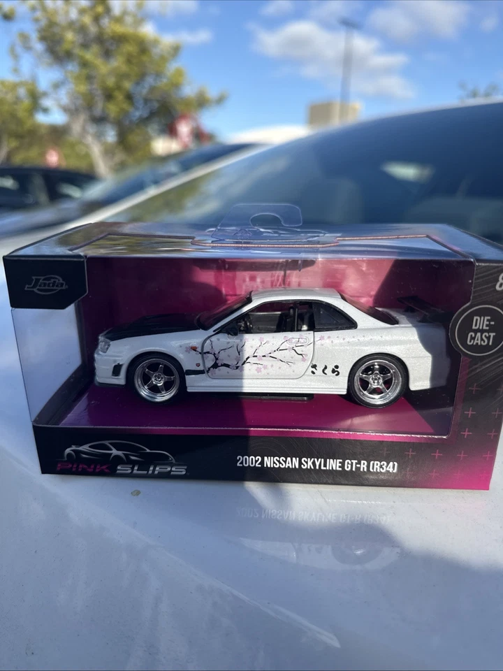 Nissan Skyline GT-R (R34) 2002 Jada Toys Pink Slips blanco - escala 1:32 NUEVO Foto 1 de 1