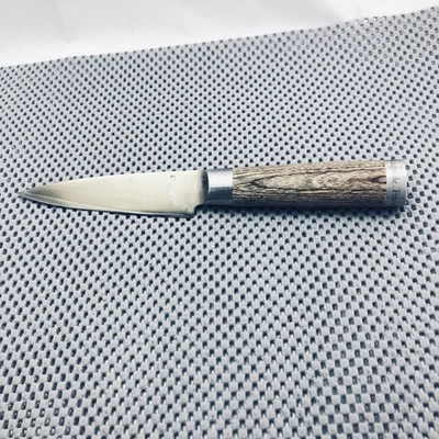 Cuchillo de chef japonés Kai de acero al carbono 12 cm 4 3/4 pulgadas Foto 1 de 4