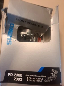 DERAGLIATORE ANTERIORE SHIMANO FD 2300 8 MARCE DOPPIO BRASO PER RICAMBI O RIPARAZIONE - Foto 1 di 2