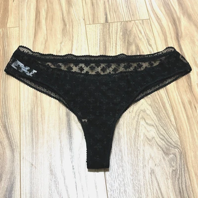 Новые без ценников стринги Simone Perele размер 4 (большие) с цветочной сеткой черные - Изображение 1 из 4