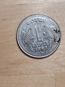 India 1 Rupee coin, 1999. KM# 92.2, stainless steel. Ashoka lion, corn stalks. - Picture 1 of 4