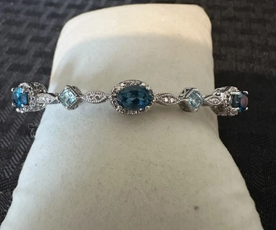 "BRAZALETE VINTAGE CON BISAGRAS TOPACIO AZUL Y AZUL CLARO LONDRES ESTERLINA 7,5""" Foto 1 de 4