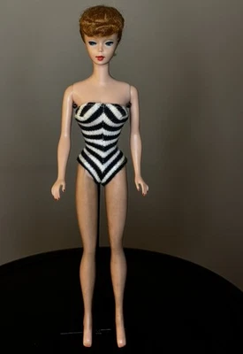  Barbie #5 con pelo de Titian y cola de caballo.  Seis trajes vintage y estuche grande Foto 1 de 4