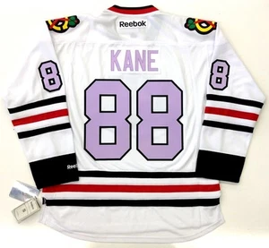 CAMISETA PREMIER PATRICK KANE CHICAGO BLACKHAWKS LAVANDA CÁNCER REEBOK - Imagen 1 de 5