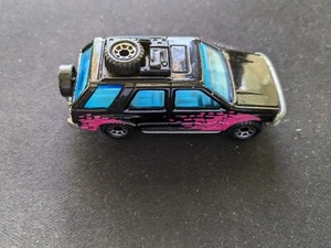 Tyco Matchbox Isuzu Rodeo 1994 negro y rosa - Imagen 1 de 6